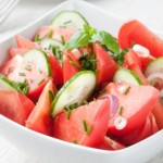 cucumber and tomato salad in a bowl