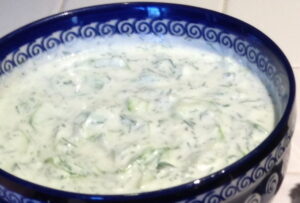 tzatziki cucumber sauce in a blue bowl